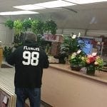 At Exotic Flowers in Boston, employees don a sweatshirt featuring the name of a favorite New England Patriots player — who's last name happens to be flowers — as a way to create connection with customers.